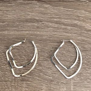 Sterling silver hoop earrings.